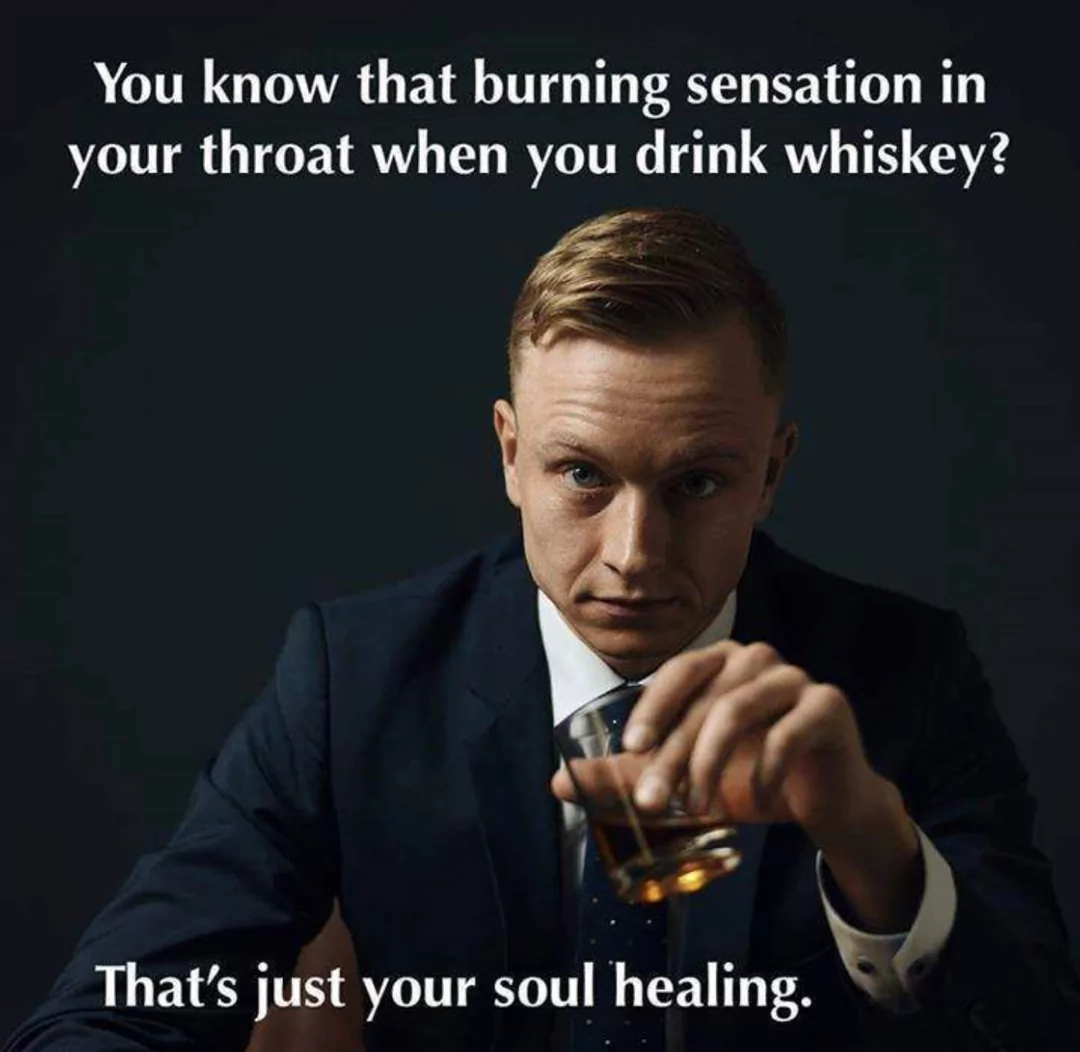 Man in suit holding whiskey glass with caption about soul healing
