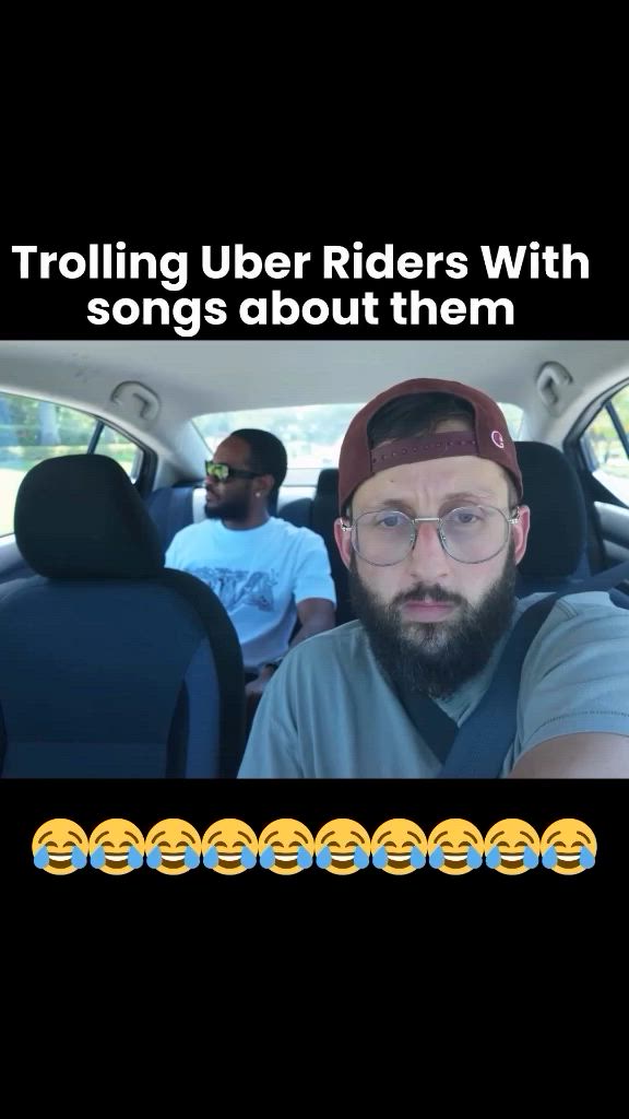 Man in car wearing cap and glasses, with passenger behind; text overlay reads 'Trolling Uber Riders With songs about them'